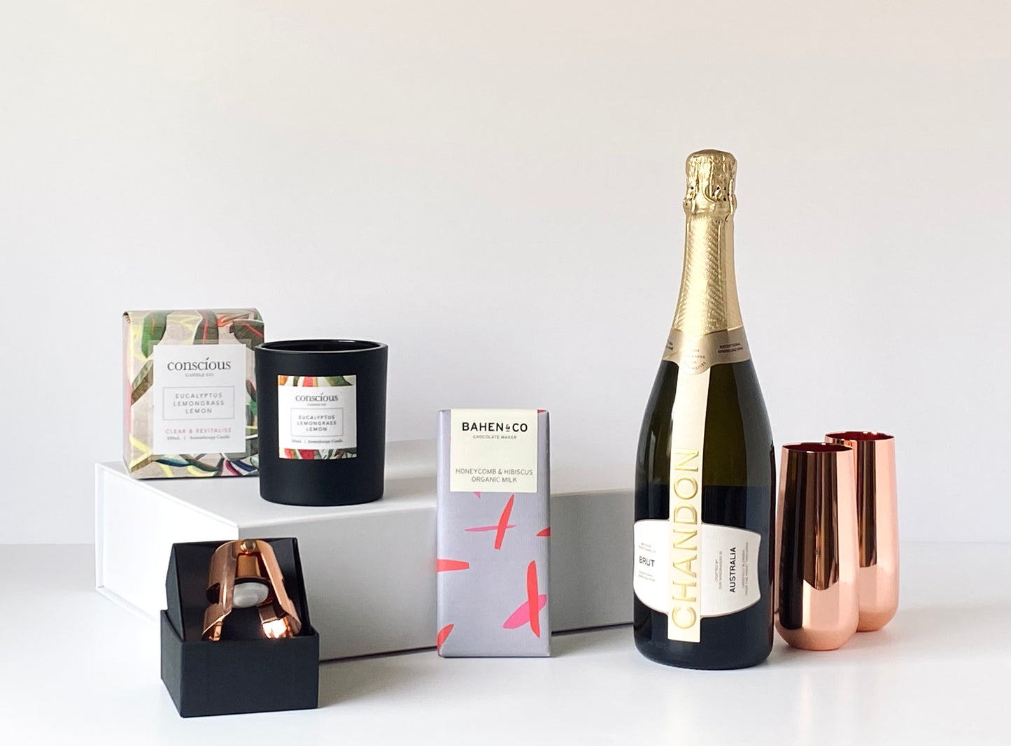 The Luxe Celebration - Chandon sparkling wine, copper champagne flutes, copper stopper, aromatherapy candle and Bahen & Co chocolate with white magnetic gift box - Gift Bento