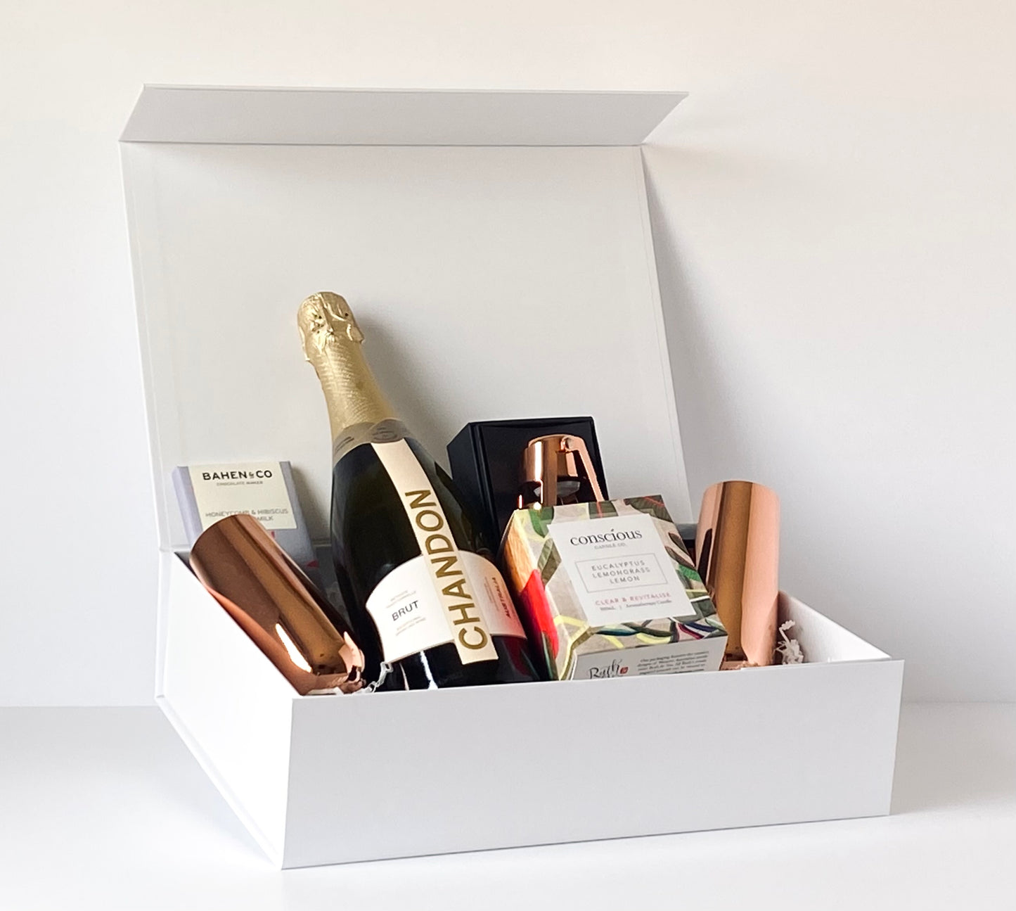 The Luxe Celebration - gift box contents arranged inside open white magnetic box, angled front view - Gift Bento
