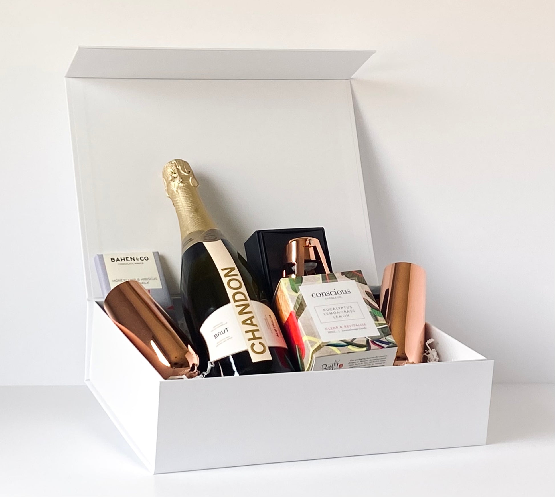 The Luxe Celebration - gift box contents arranged inside open white magnetic box, angled front view - Gift Bento