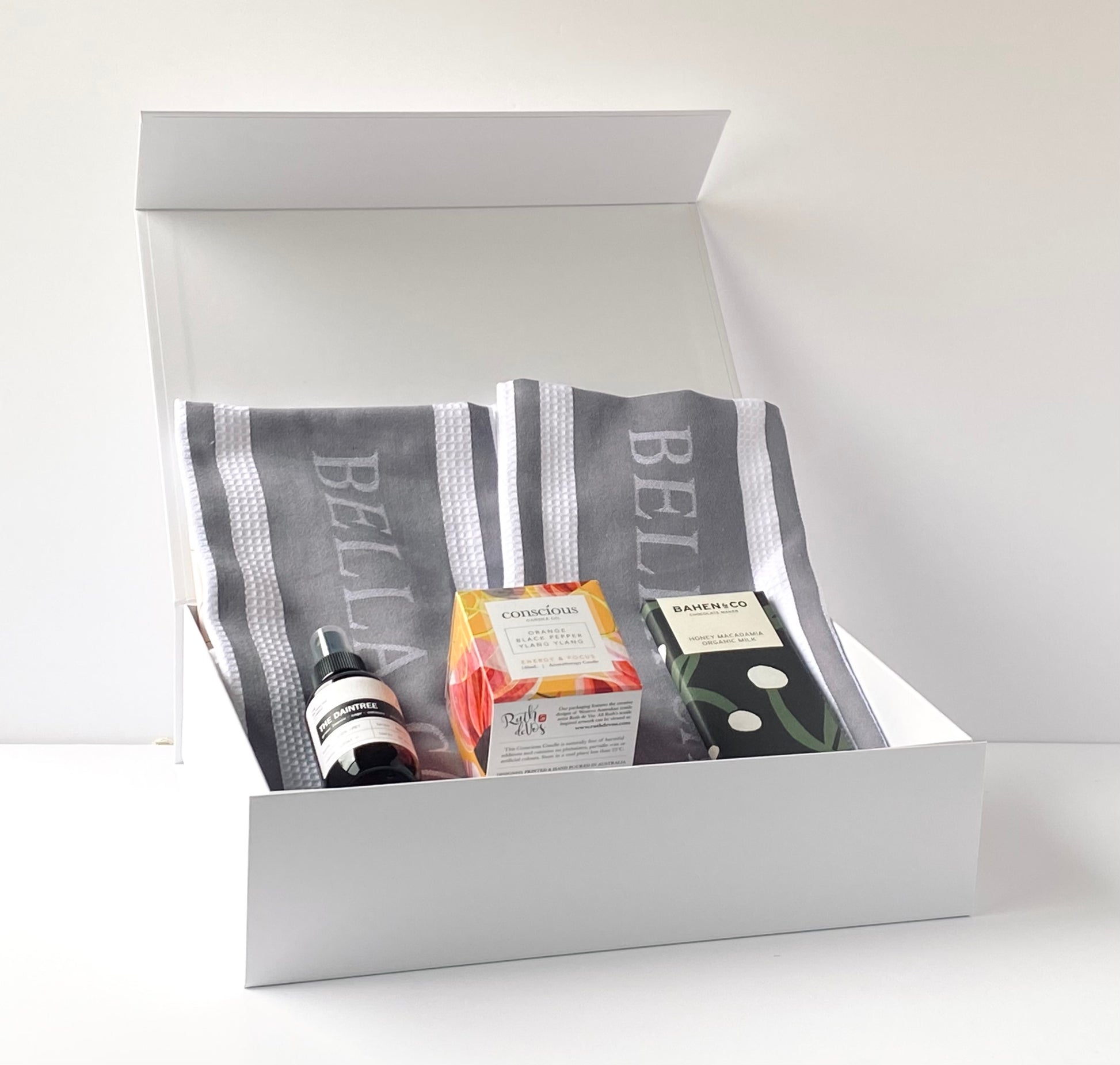The Settle In Box - premium Australian settlement gift box contents arranged inside open white magnetic box - Gift Bento