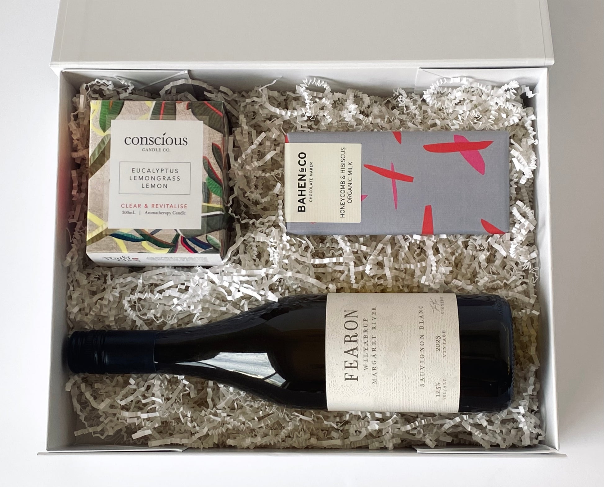 The Wine Lovers Indulgence Malbec - Fearon Wines Malbec with candle and chocolate inside gift box, top-down view - Gift Bento